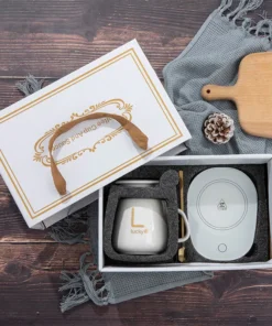 Skodelica z grelnikom v darilni škatli